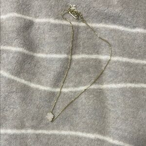 Kendra Scott Elegant Gold Necklace with White Pendant